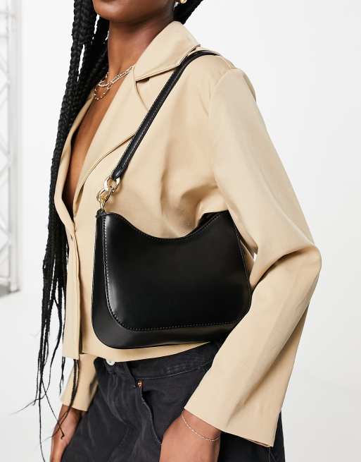 ASOS DESIGN curved 90s shoulder bag with chain strap in black