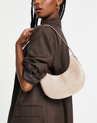 ASOS DESIGN curved shoulder bag with long strap in cream croc