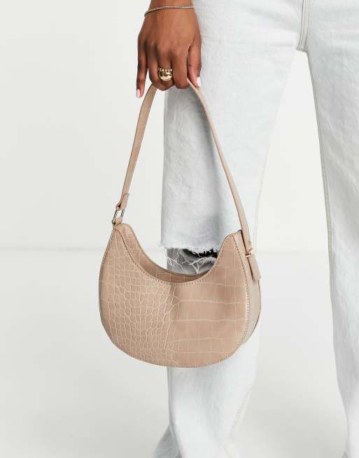 ASOS DESIGN elongated shoulder bag with wide strap in off white