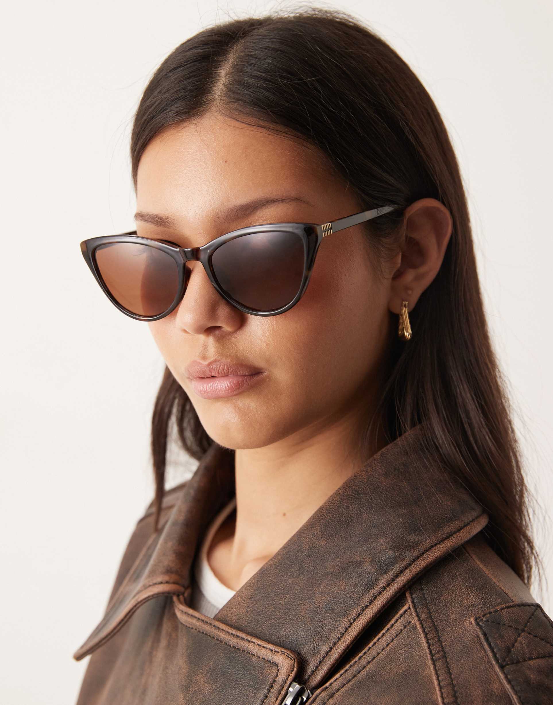 asos design curved slim cat eye sunglasses in tort