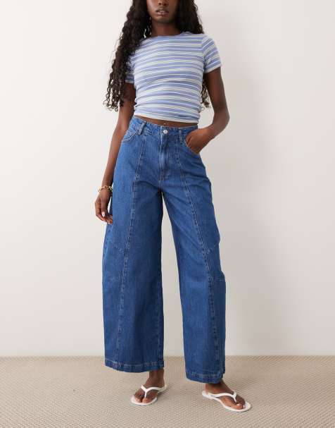 ASOS DESIGN curved yoke jeans with seam details in midwash blue - view 1