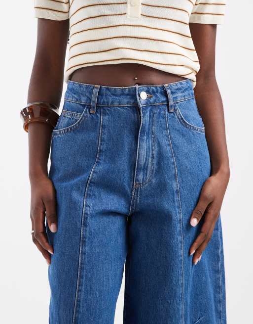 ASOS DESIGN curved yoke jeans with seam details in midwash blue, 4 of 5