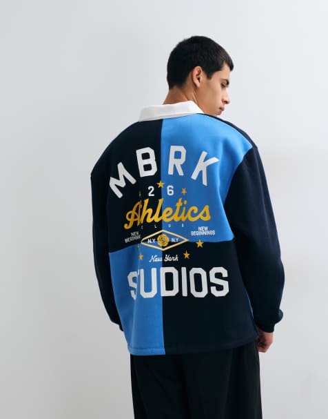 ASOS DESIGN cut and sew rugby polo with back print in blue - view 1