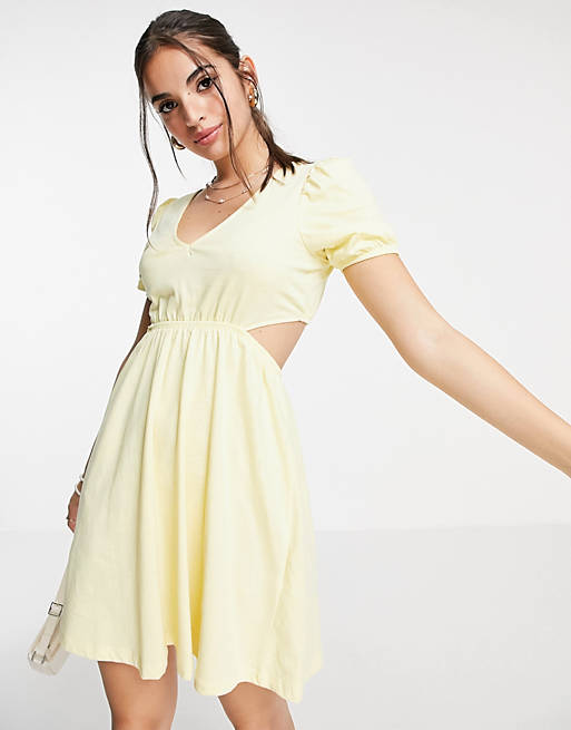 Dresses cut out back mini dress in pastel yellow 