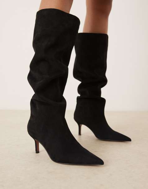 ASOS DESIGN – Cydney – Lässige, kniehohe Stiefel zum Reinschlüpfen aus Wildlederimitat in Schwarz - view 1