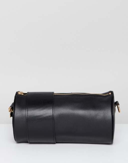 Cylinder store crossbody bag