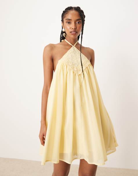 ASOS DESIGN – Cytrynowa sukienka mini o fasonie bombki z haftowanym dekoltem halter - view 1
