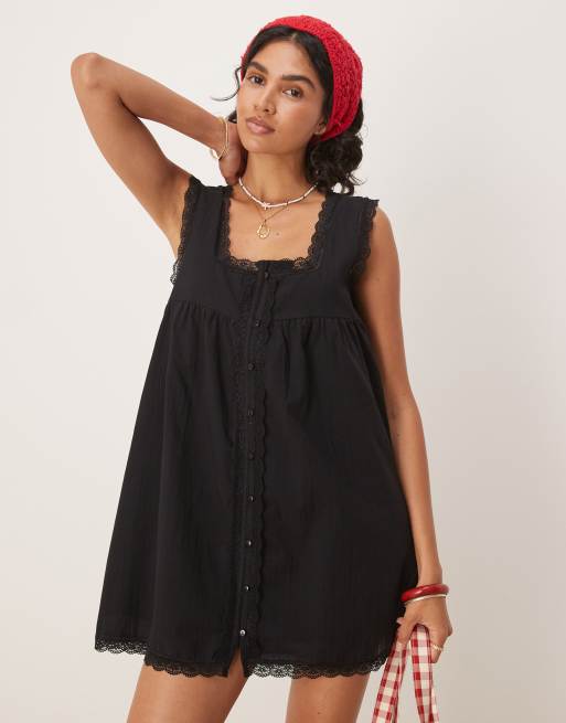 ASOS DESIGN – Czarna bawełniana sukienka babydoll na ramiączkach wykończona koronką