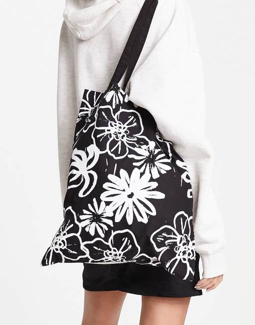 ASOS DESIGN – Czarna bawełniana torba typu tote w abstrakcyjny kwiatowy wzór