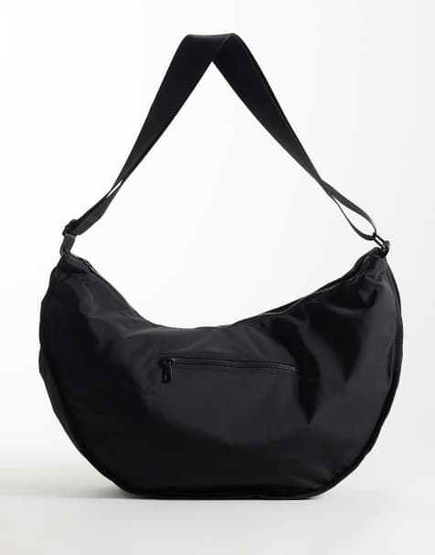 ASOS DESIGN – Czarna nylonowa torebka crossbody typu sling - view 1