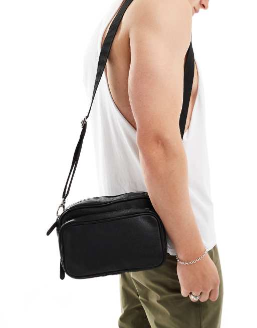 ASOS DESIGN – Czarna skórzana torebka crossbody z kieszeniami na zamek