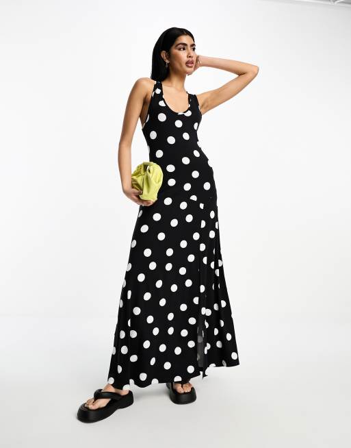 ASOS DESIGN – Czarna sukienka midi w białe kropki ze skręconym tyłem i dekoltem w kształcie litery U 