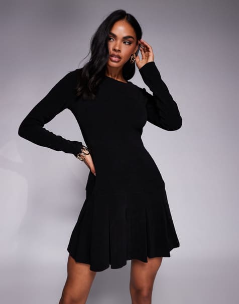 ASOS DESIGN – Czarna sztruksowa sukienka mini z obniżonym stanem i plisowaną spódnicą - view 1