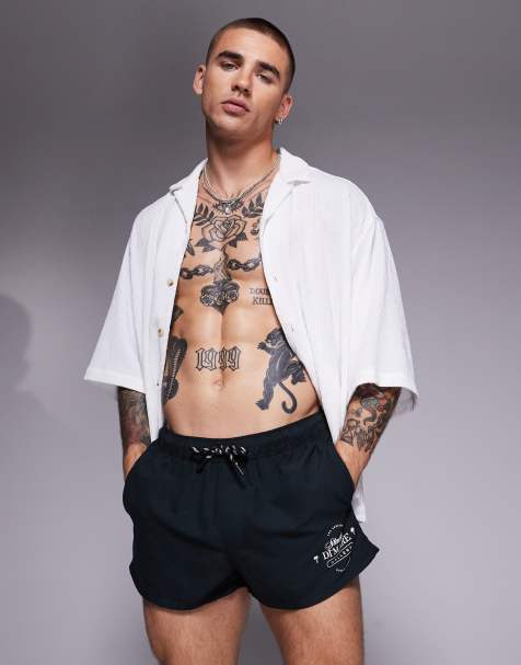 ASOS DESIGN swim shorts in super short length in black and white print