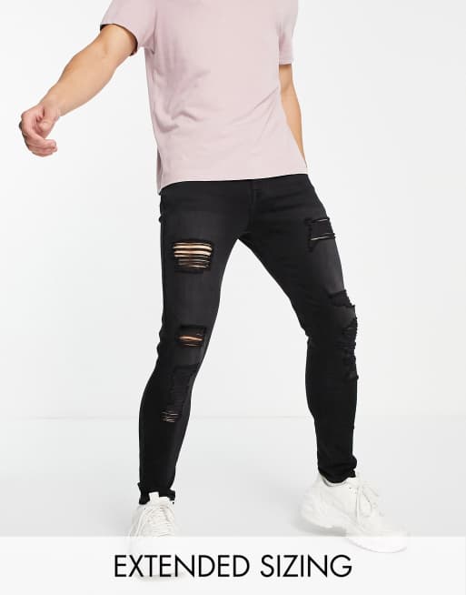 ASOS DESIGN – Czarne bardzo obcisłe jeansy z power stretchem, efektem sprania i dużymi rozdarciami