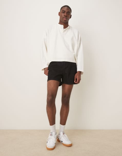 ASOS DESIGN short length slim denim shorts with pleats in black