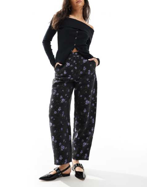 ASOS DESIGN floral jacquard arch leg tailored trouser in black