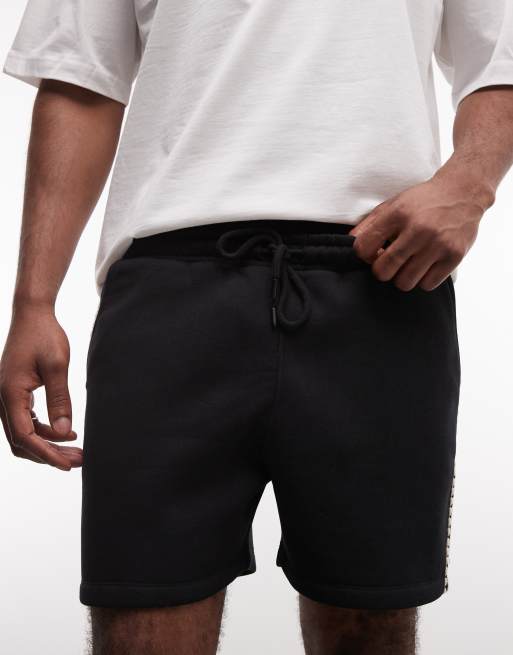 ASOS DESIGN – Czarne dżersejowe szorty oversize z lampasami, 4 z 5