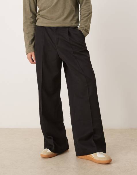 ASOS DESIGN – Czarne eleganckie luźne spodnie z zakładkami i widocznym guzikiem - view 1