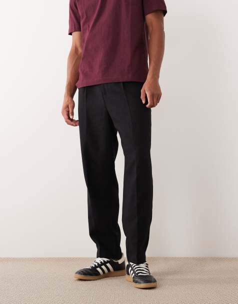 ASOS DESIGN – Czarne eleganckie spodnie o luźnym kroju ze zwężanymi nogawkami z mieszanki wełny - view 1