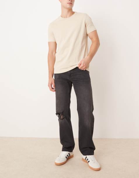 ASOS DESIGN straight fit jeans with rips in black wash 