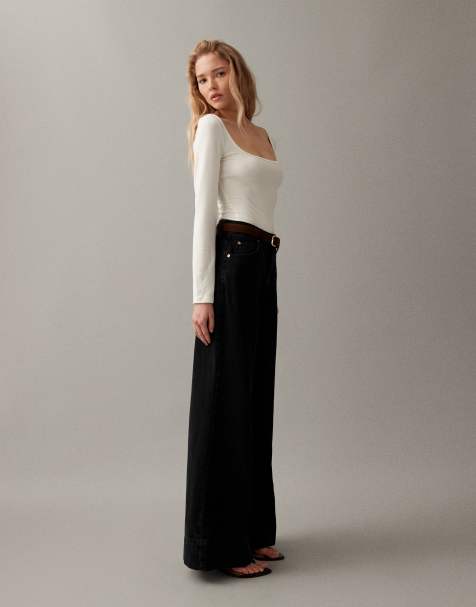 ASOS DESIGN – Czarne jeansy z szerokimi nogawkami, kantem z przodu i paskiem - view 1