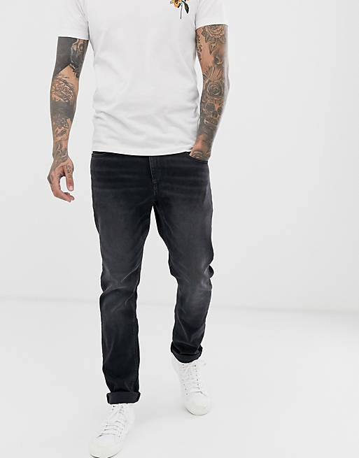 ASOS DESIGN - Czarne jeansy ze spranego denimu ze stretchem o obcisłym kroju