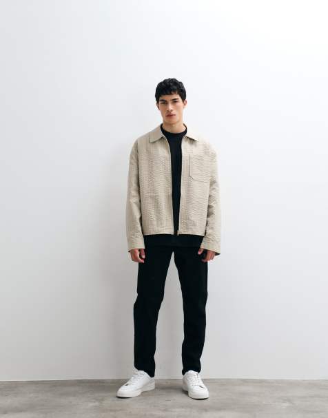 ASOS DESIGN tapered jeans in black