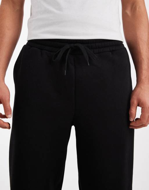 ASOS DESIGN – Czarne joggersy basic z szerokimi nogawkami, 4 z 5