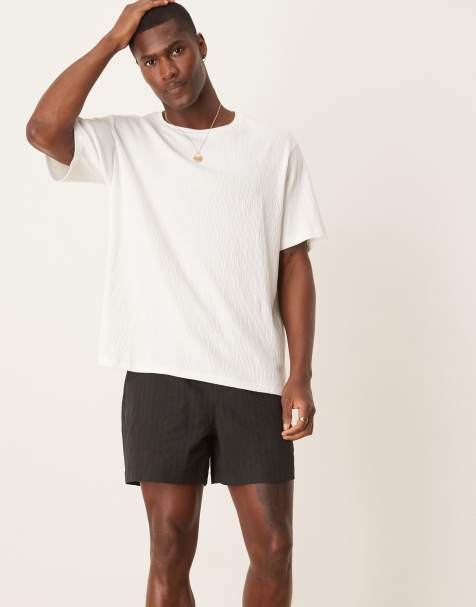 ASOS DESIGN shorter length striped shorts in black
