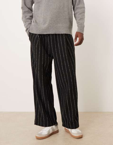 ASOS DESIGN – Czarne, luźne joggersy w prążki - view 1