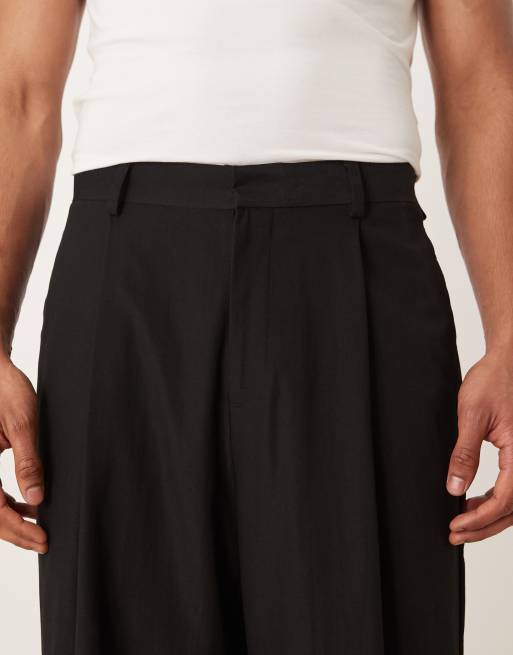 ASOS DESIGN – Czarne spodnie garniturowe o balonowym kroju, 3 z 5