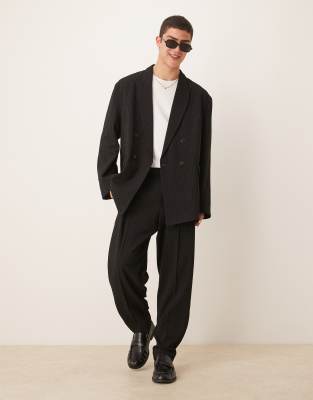 ASOS DESIGN – Czarne spodnie garniturowe oversize o zwężanym kroju w prążki - view 1