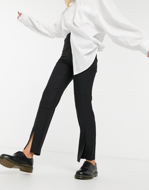 ASOS DESIGN – Czarne spodnie o luźnym kroju z dopasowanymi nogawkami i rozcięciem z przodu