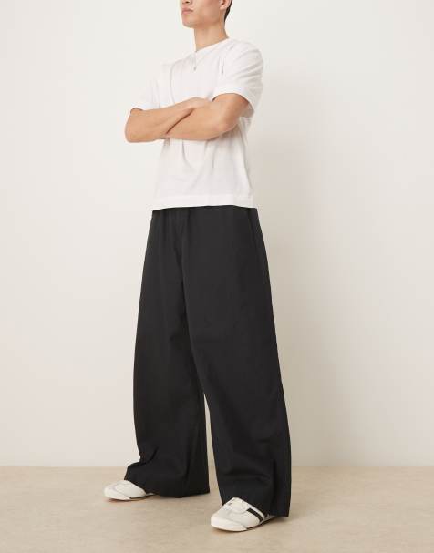 ASOS DESIGN loose trousers in black linen blend