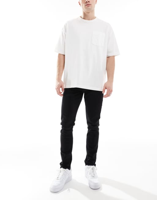 ASOS DESIGN – Czarne sprane jeansy o obcisłym kroju
