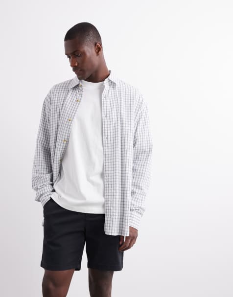 ASOS DESIGN – Czarne średniej długości dopasowane szorty chinosy o luźnym kroju - view 1