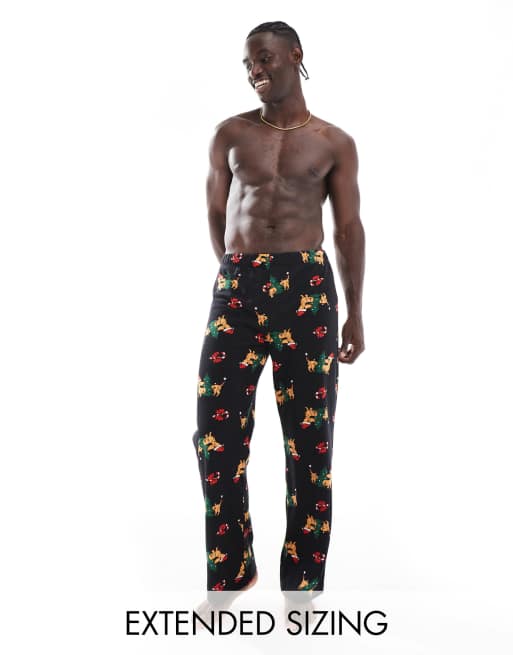 ASOS DESIGN – Czarne, świąteczne spodnie domowe z motywem jamników