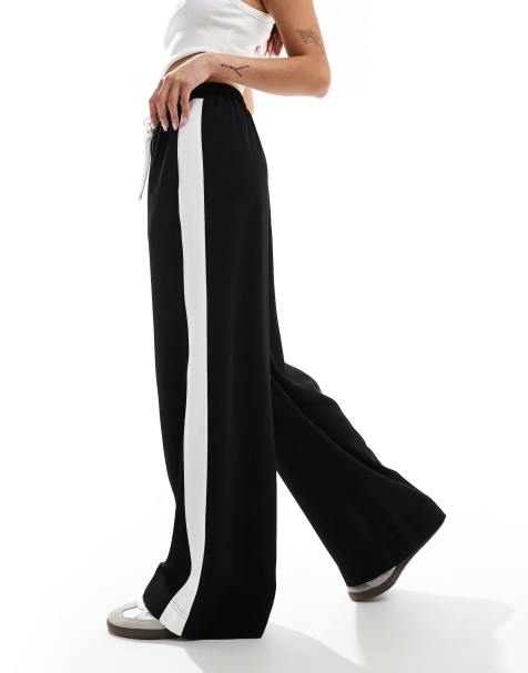 ASOS DESIGN – Czarne wciągane spodnie z kontrastową wstawką - view 1