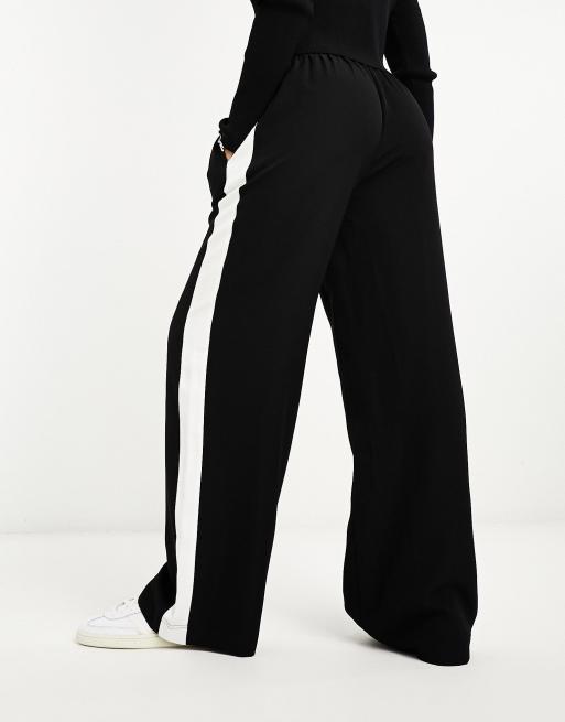 ASOS DESIGN – Czarne wciągane spodnie z kontrastowymi lampasami, 3 z 4