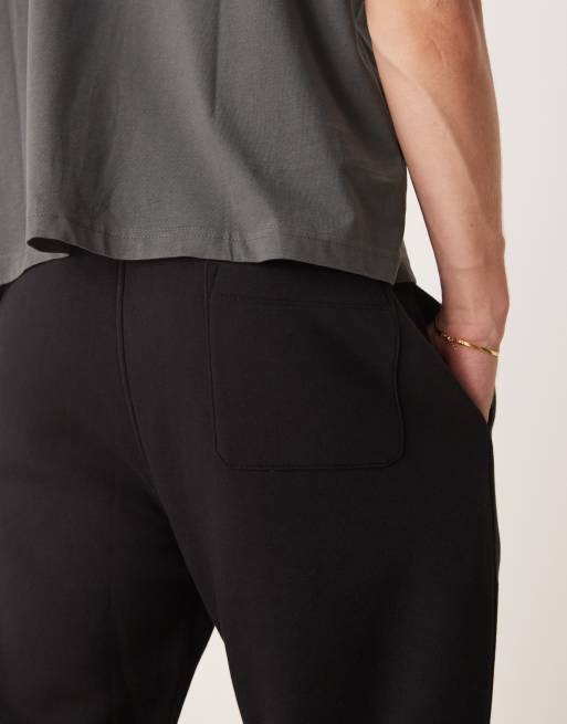 ASOS DESIGN – Czarne zwężane joggersy basic  , 3 z 5