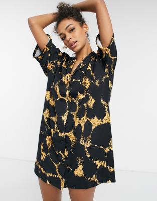 ASOS DESIGN – Czarno-żółta sukienka koszulowa mini w abstrakcyjny zwierzęcy wzór