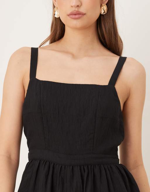 ASOS DESIGN – Czarny kombinezon z baskinką w talii, 3 z 4