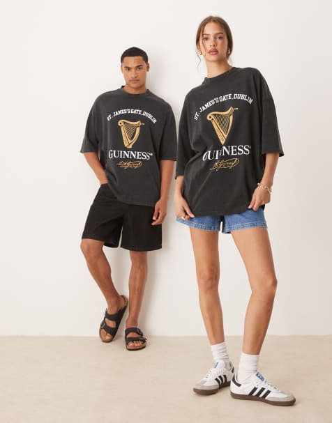 ASOS DESIGN – Czarny sprany T-shirt unisex oversize z nadrukiem Guinness - view 1
