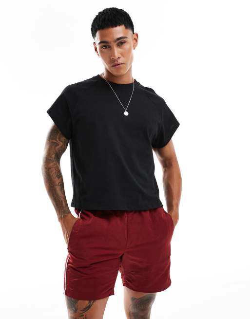 ASOS DESIGN – Czarny T-shirt o luźnym kroju i krótkim fasonie z krótkimi rękawkami