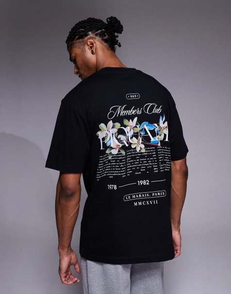 ASOS DESIGN – Czarny T-shirt o luźnym kroju z kwiatową grafiką - view 1