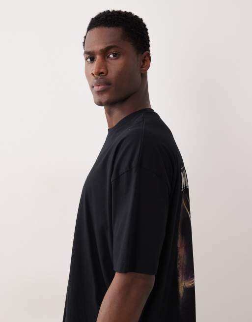 ASOS DESIGN – Czarny T-shirt oversize z nadrukiem z napisem „Mandalorian”, 4 z 5