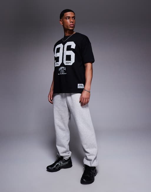ASOS DESIGN – Czarny T-shirt oversize ze sportową grafiką, 3 z 4