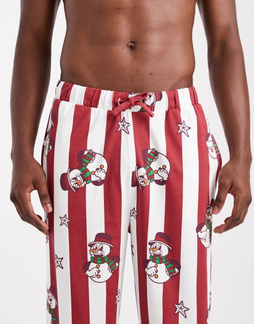 ASOS DESIGN – Czerwone spodnie od piżamy w paski z grafiką w bałwanki, 4 z 4