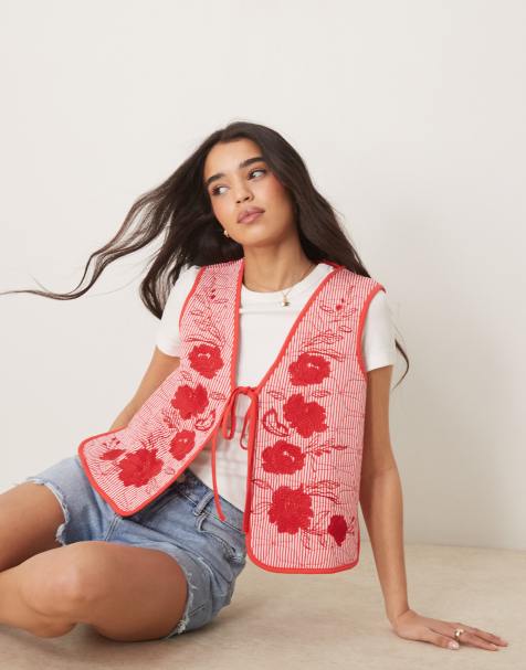 ASOS DESIGN quilted waistcoat with striped red and white embroidery